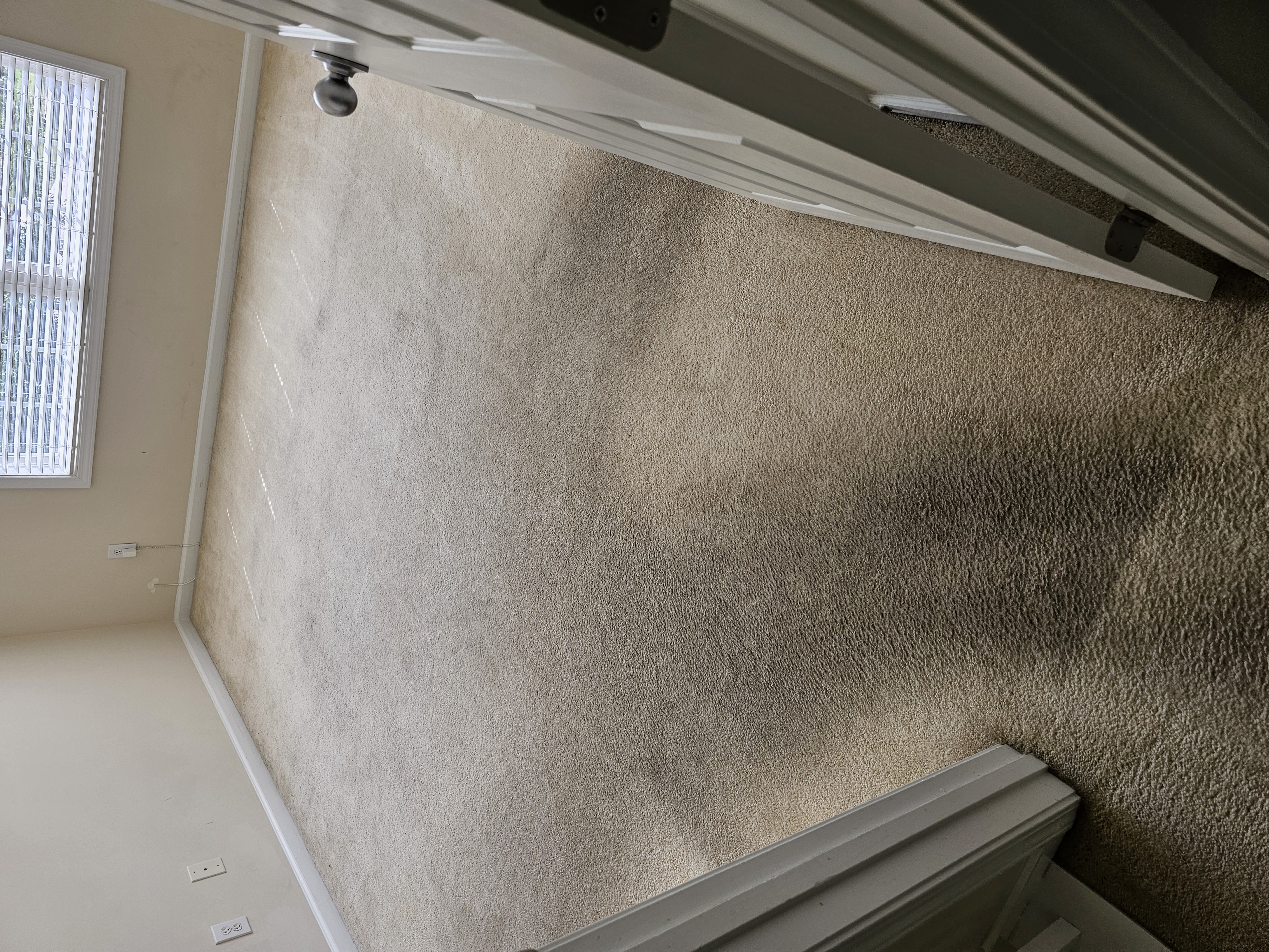 Before bedroom carpet cleaning in a Georgia home